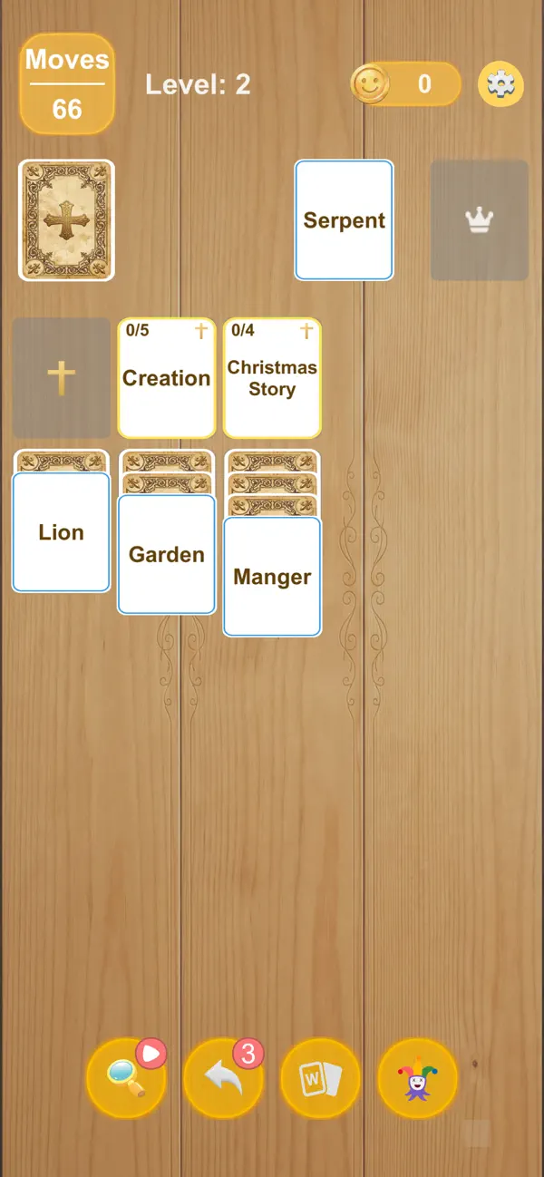 Bible Solitaire board with Creation and Christmas Story categories, and Lion, Garden and Manger word cards.