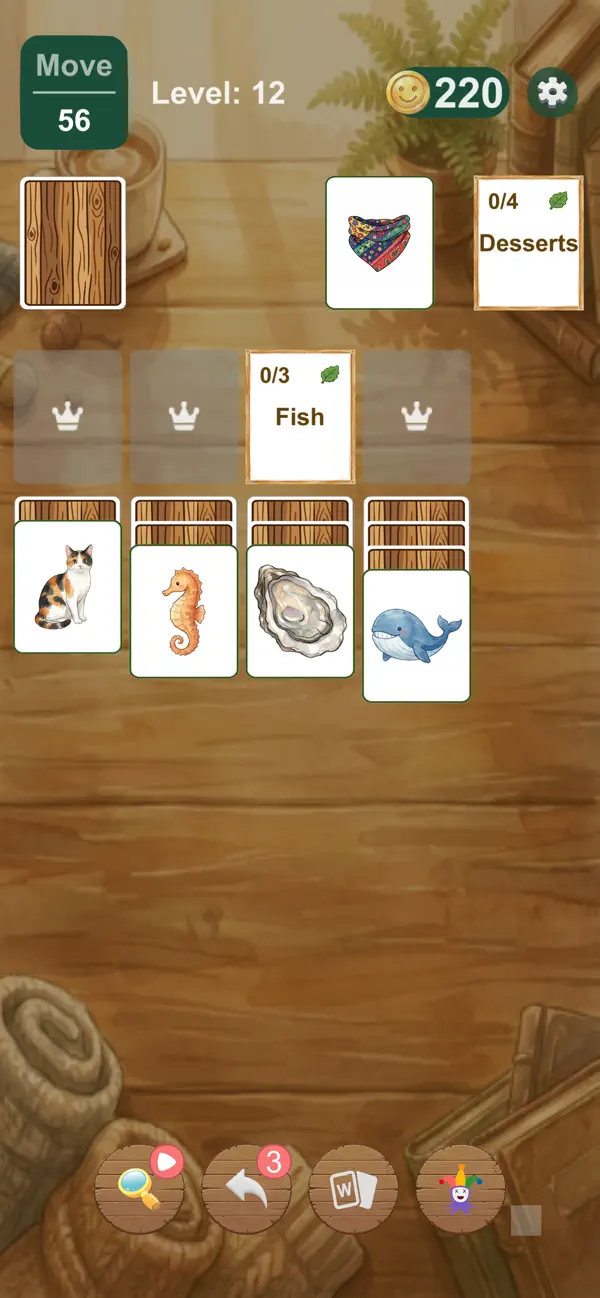 Picture Solitaire game with Fish and Desserts categories and illustrated cat, seahorse, oyster and whale cards.